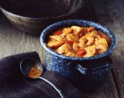 Homemade fish stew with peppers in bowl — Stock Photo