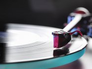 Close up of a vinyl record and stylus on turntable — Stock Photo