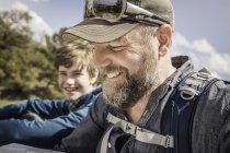 Close up of father and teenage son on hiking trip, Cody, Wyoming, USA — Stock Photo