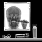X-ray of person brushing teeth in bathroom mirror — Stock Photo