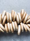 Top view of fresh bagels strung together — Stock Photo