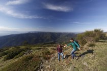 Hikers trekking on hilltop, Montseny, Barcelona, Catalonia, Spain — Stock Photo