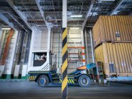 Container truck inside industrial cargo ship hold — Stock Photo