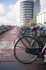 Bicycles parked on city sidewalk — Stock Photo