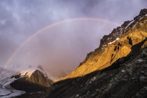 Rainbow and dramatic sky over Torre glacier in Los Glaciares National Park, Patagonia, Argentina — Stock Photo