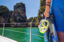 Cropped view of woman on yacht holding snorkel, Koh Hong, Thailand, Asia — Stock Photo