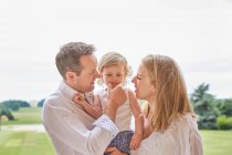 Couple with baby daughter — Stock Photo