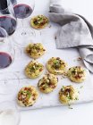 Mini pizzas topped with roasted cauliflower and gorgonzola, elevated view — Stock Photo