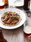 Barbecue chicken pizza on white plate — Stock Photo