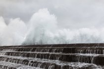 Sea water running over sea wall, Santa Cruz de Tenerife, Canary Islands, Spain, Europe — Stock Photo