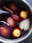 Poached pears in pan, overhead view — Stock Photo