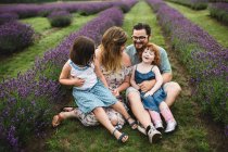 Family in lavender field, Campbellcroft, Canada — Stock Photo