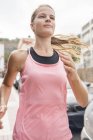 Portrait of woman in sport clothing jogging — Stock Photo