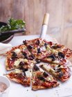 Capricciosa pizza on pizza peel, close-up — Stock Photo