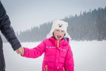 Mother and daughter on frozen Lake Louise, Canada — Stock Photo