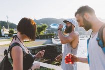 Three young hipsters at lake Como, Como, Lombardy, Italy — Stock Photo