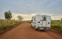 Campervan driving on dirt road, Pantanal, Mato Grosso, Brazil, South America — Stock Photo