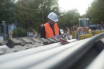 Road construction engineer in white hard hat, Hannover, Germany — Stock Photo