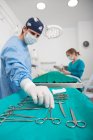 Vets performing operation in surgery — Stock Photo