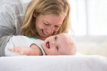 Mother playing with baby son — Stock Photo