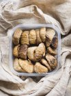 Top view of Dried figs in plastic container — Stock Photo