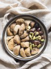 Top view of dried fruits and nuts in a bowl — Stock Photo