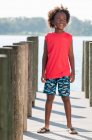 Portrait of young boy standing on pier, Winter Park, Florida, USA — Stock Photo