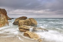 Long exposure of waves on rocks in sea, Odessa, Odeska Oblast, Ukraine, Europe — Stock Photo