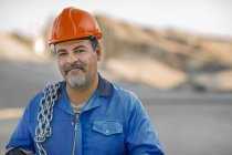 Portrait of quarry worker in quarry — Stock Photo