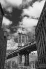 Low angle view of Brooklyn Bridge, B&W, New York, USA — Stock Photo