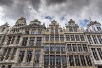 Low angle view of historic town house facades at Grand Central, Brussels, Belgium — Stock Photo