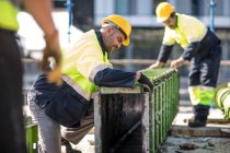 Construction workers on building site — Stock Photo