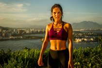Portrait of female runner looking at camera, Rio de Janeiro, Brazil — Stock Photo