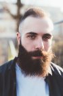 Portrait of bearded man looking at camera — Stock Photo