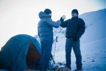 Men camping in Los Andes mountain range, Santiago, Chile — Stock Photo