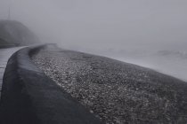 Sea wall in mist, Seaham Harbour, Durham, UK — Stock Photo