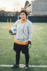 Portrait of female football player — Stock Photo