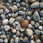 Top view of grey pebbles background, full frame — Stock Photo