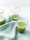 Watercress, rock melon smoothie, high angle view — Stock Photo