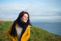 Woman by coast, Dunmore, Waterford, Ireland — Stock Photo