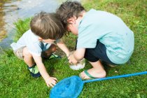 Two boys with fishing net — Stock Photo