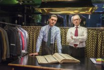 Two tailors in traditional tailors shop — Stock Photo