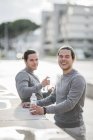 Young male twins taking training break — Stock Photo