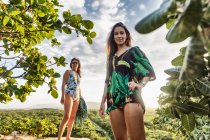 Portrait of mother and daughter in swimwear looking at camera smiling, Caucaia, Ceara, Brazil — Stock Photo