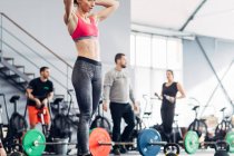 Small group of people training in gym — Stock Photo