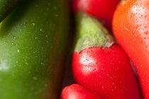 Close up Green and red chili peppers — Stock Photo