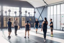 Group of people training in gym — Stock Photo