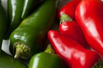 Green and red chilli peppers, full frame — Stock Photo