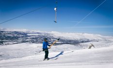 Man on a ski-lift in Vasterbottens Lan, Sweden. — стокове фото