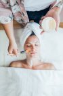 Woman getting a facial treatment in a beauty salon. — Stock Photo